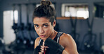 Woman, portrait and gloves for martial arts at gym, training and confidence with power for fight. Person, athlete and fist with combat sports, exercise and workout at fitness club in Costa Rica