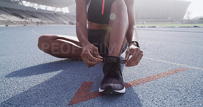 Buy stock photo Shoes, tying laces and hands on stadium, prepare for running or sports for workout on race track. Fitness, person or sprinter legs at arena for practice, training and start cardio exercise outdoor