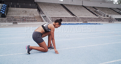 Buy stock photo Exercise, ready and start of race with woman in stadium for challenge, competition or sports tournament. Concentration, fitness and launch with runner at line in arena for event, performance or speed