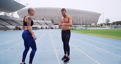 Buy stock photo Fitness, team and check watch on track for running speed, health stats and training performance. Sports athlete, people and exercise app at stadium for lap time, monitor workout and practice results