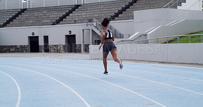 Buy stock photo Athlete, runner and woman on race track with back for fitness, training and cardio performance. Sprinter, speed or fast female person with running at stadium for sports, practice and exercise space