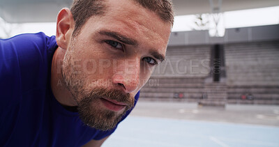 Buy stock photo Portrait, runner and man on break at race track for exercise recovery, health and serious face. Stadium, tired athlete and rest for fitness, cardio challenge or determination for sports with space