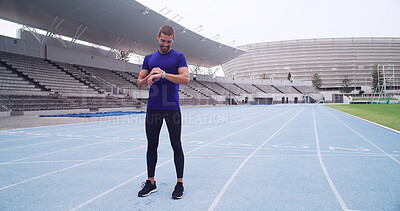 Buy stock photo Man, athlete and smart watch at stadium with smile, stats and heart rate for exercise routine on track. Person, application and happy runner with results, clock or sports at fitness club in Argentina