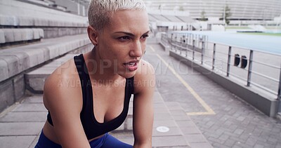 Buy stock photo Athlete, thinking and tired with breathing at stadium for running recovery, workout burnout or rest. Runner, girl and exhausted with break on stairs for training challenge and contemplating at arena