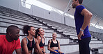Runner, coach and team with people on stadium steps for workout break, fitness and support. Training, cardio challenge and sports athlete with friends on stairs for marathon and personal trainer