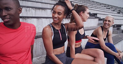 Buy stock photo Conversation, break and exercise with people on stadium bleachers for bonding or sports training. Fitness, recovery and rest with group of athlete friends speaking in venue for workout discussion