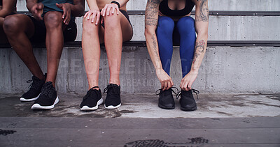Buy stock photo Fitness, hands or people tie shoes at stadium to prepare for exercise with friends outdoor for relax. Sports group, legs and person tying sneakers with runners getting ready to start practice