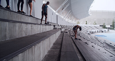 Buy stock photo Runner, tired and team with people on stadium steps for workout break, fitness and support. Training drills, cardio challenge and sports athlete with friends resting on stairs for marathon practice
