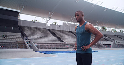Buy stock photo Black man, athlete and portrait at stadium for training routine, challenge and ready on track. African person, runner and outdoor at arena for fitness, exercise and workout at sports club in Kenya