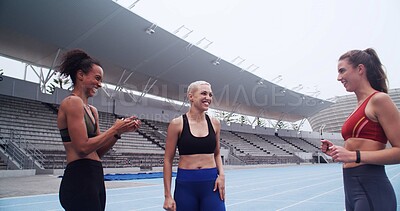 Buy stock photo Happy woman, team and motivation on track for exercise with applause, support or huddle for workout. People, group and athlete with smile, discussion and excited with training goals at sports stadium