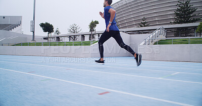 Buy stock photo Running, speed and fitness with man on race track for marathon practice, workout and cardio challenge. Sports athlete, exercise and competition with person in stadium for health, runner and sprint