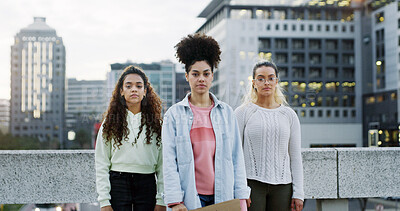 Buy stock photo Portrait, protest and women in city, serious and urban town with human rights equality. People, outdoor and group in street, activism and change future with female empowerment, resistance and freedom