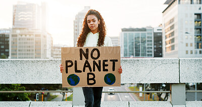 Buy stock photo Portrait, woman and protest with poster in city for awareness, climate change and global warming. Female person, billboard sign and stop pollution for planet safety, green movement and society impact