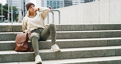 Buy stock photo Girl, stairs and thinking with fashion in city for travel adventure, journey break or winter style. Person, tourist or relax on steps in urban town for holiday reflection, casual clothes and vacation