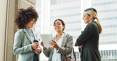 Buy stock photo Conversation, tablet and business women in city with research for finance negotiation in collaboration. Discussion, digital technology and team of female financial advisors with investment planning.