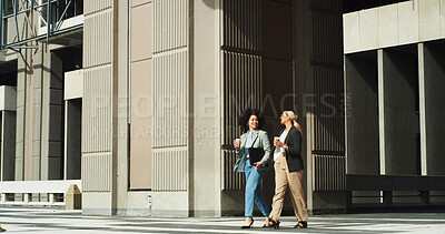 Buy stock photo Commuting, employees and women with coffee, smile or travel to meeting for sales, laughing and walk. Outdoor, colleagues and salesperson with caffeine, collaboration and communication for project