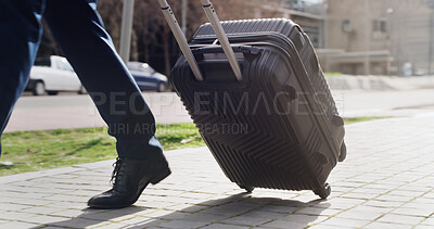 Buy stock photo Feet, luggage and walking with businessman in city for commute, journey or travel to location. Destination, steps and suitcase with legs of employee outdoor on sidewalk for international trip