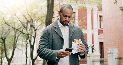 Buy stock photo Business, man and phone with food for travel in city, browsing social media and lunch break. Male person, reading and mobile with healthy meal, direction search and notification update for urban trip