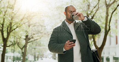 Buy stock photo Businessman, drinking or city with phone for commute, travel or social media at outdoor park. Man, walking or checking mobile smartphone with beverage for business schedule or job opportunity in town