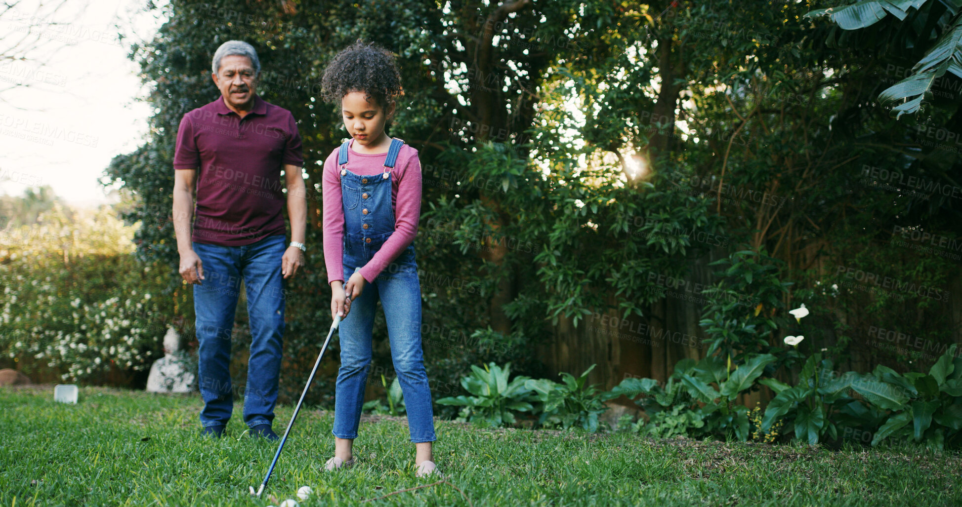Buy stock photo Grandfather, girl and playing golf outdoor for hobby, learning skills and teaching technique. Family, old man and kid with sports in garden for bonding together, practice support or child development