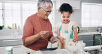 Baking, happy and grandma with child in kitchen for learning, teaching and helping for cookies. Family, home and grandmother with girl with flour, ingredients and bonding for dessert, cake and pastry