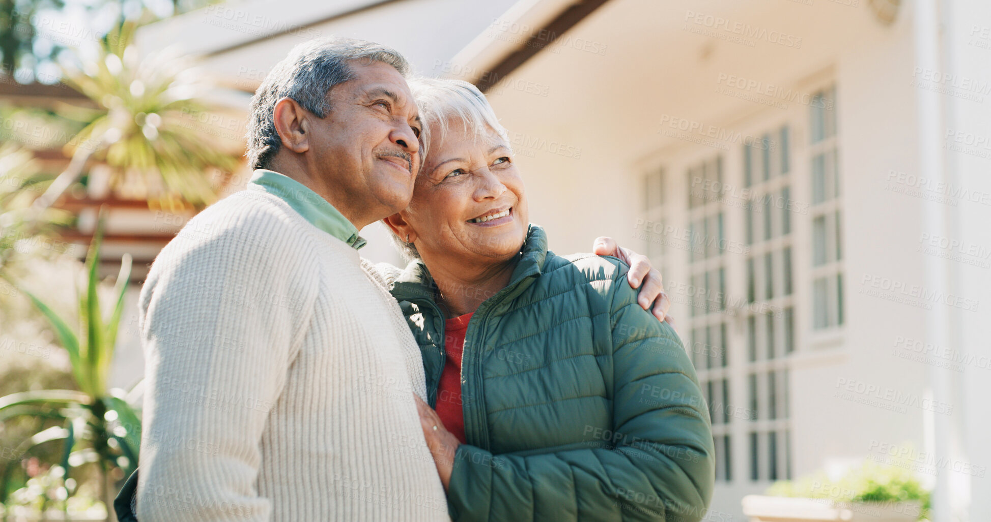 Buy stock photo Happy, hug and senior couple in backyard with smile for retirement home, real estate and security. Marriage, thinking and mature man with woman embrace for bonding, relationship and love outdoor
