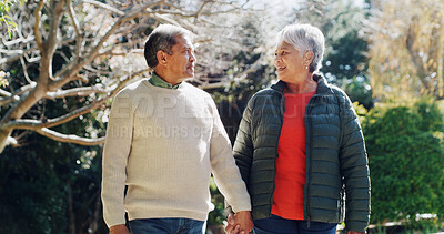Buy stock photo Outdoor, holding hands and senior couple with love, conversation and bonding together with romance. Forest, happy man and woman with relationship, walking and peace with support, marriage and date