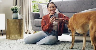 Buy stock photo Credit card, online shopping or phone with dog and woman in living room of home for checkout. App, ecommerce or purchase with happy customer and pet in apartment for payment, transfer and transaction