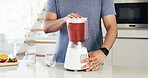 Detox, smoothie and hands with a blender for healthy diet, nutrition and fruit in kitchen. Natural, appliance and male person with vegan ingredients for drink, protein shake or supplement in home