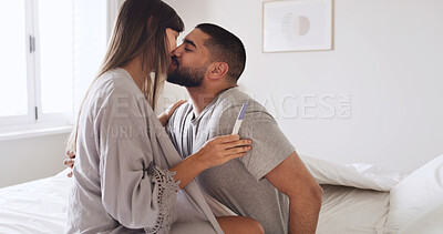 Buy stock photo Pregnancy test, kiss and love with couple in bed for ovulation prediction, celebration and good news. Cycle tracking, fertility success and support with man and woman in home for positive result