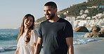Love, smile and holiday with couple at beach for travel, summer and relax. Adventure, support and vacation trip with walking, man and woman on seaside date for commitment, care and break together