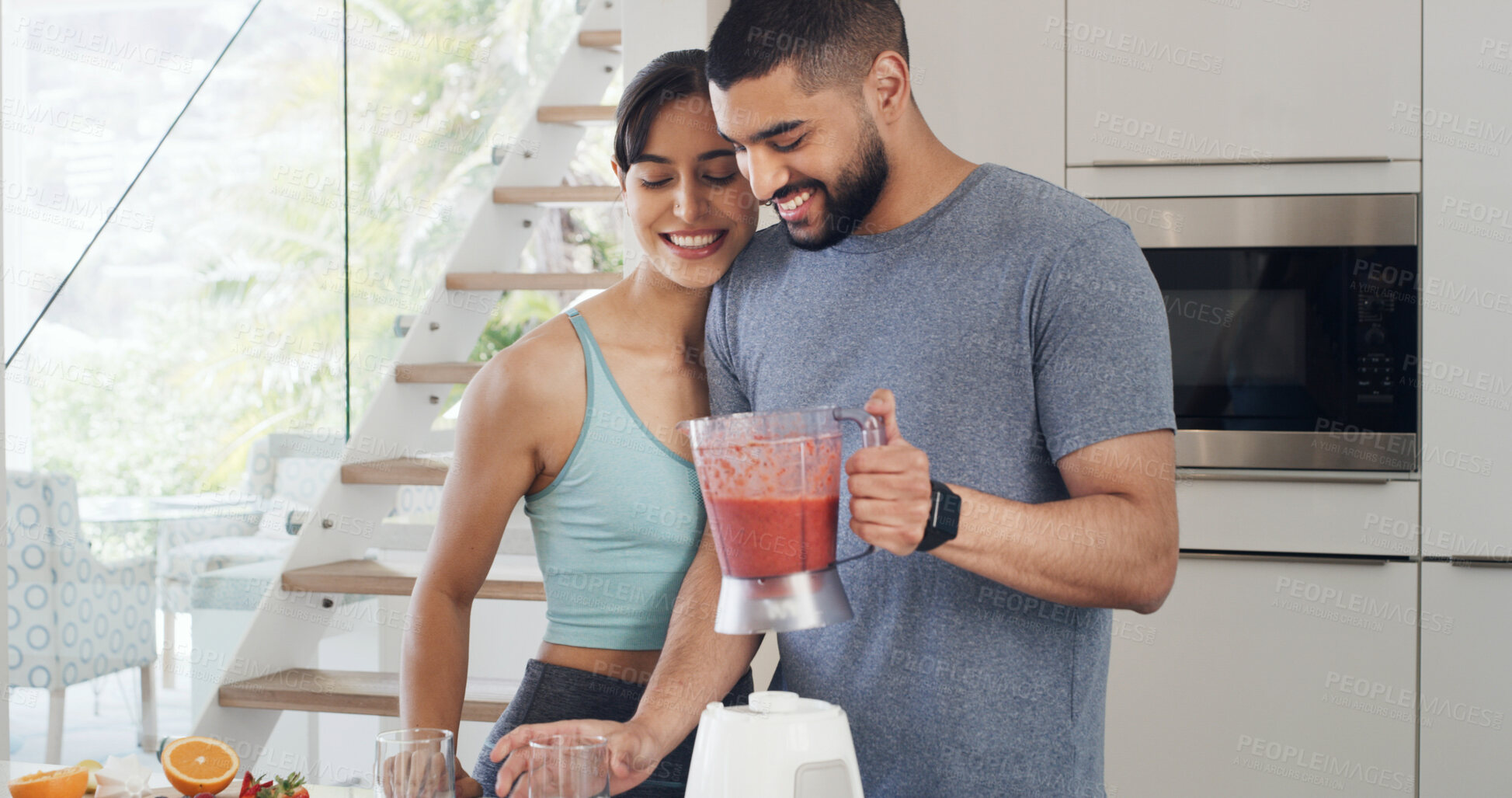 Buy stock photo Smoothie, health and couple in kitchen, smile and detox with support, relationship or wellness. Home, protein shake or man with woman, weight loss or nutrition with vitamins, happiness or blender