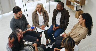 Buy stock photo Speaking, ball and meeting with people in support group for sobriety feedback, community and solidarity. Recovery check in, conversation token and counseling workshop with above of men and women