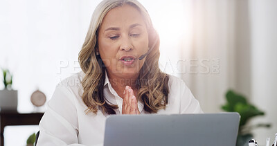 Buy stock photo Psychologist, headset and video call with laptop in office for expert advice, telehealth and support. Doctor, woman and virtual consultation at clinic for healing guidance, online counseling and help