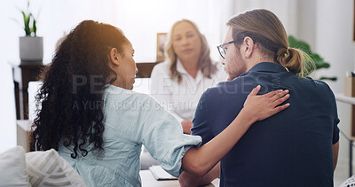 Buy stock photo Couple, therapist and counseling with support, talk and consultation for mental health at wellness clinic. People, psychologist and comfort for discussion with back, advice or help for relationship