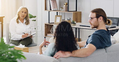 Buy stock photo Couple, therapist and talk on sofa with writing notes for consultation, mental health or support at clinic. People, psychologist and clipboard for discussion on couch, advice or help for relationship