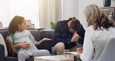 Buy stock photo Pregnant, woman and couple therapy in office, talk or expecting parents with disagreement and flare. People, argue and counseling for communication in marriage, therapist and consultation for anxiety