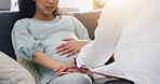 Hands, pregnant woman and psychologist with support in therapy for mental health, comfort or help. Perinatal psychiatry, doctor or patient on sofa for pregnancy anxiety, psychosis diagnosis or advice