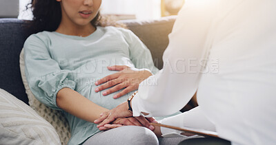 Buy stock photo Hands, pregnant woman and psychologist with support in therapy for mental health, comfort or help. Perinatal psychiatry, doctor or patient on sofa for pregnancy anxiety, psychosis diagnosis or advice