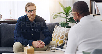 Buy stock photo Mental health, counseling and person on couch with therapist for advice, psychology and notes. Therapy, consultation and man with psychiatrist for help, support or decision with life coach on sofa