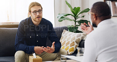Buy stock photo Mental health, counseling and man on couch with therapist for advice, psychology and notes. Therapy, consultation and person with psychiatrist for help, support or decision with life coach on sofa