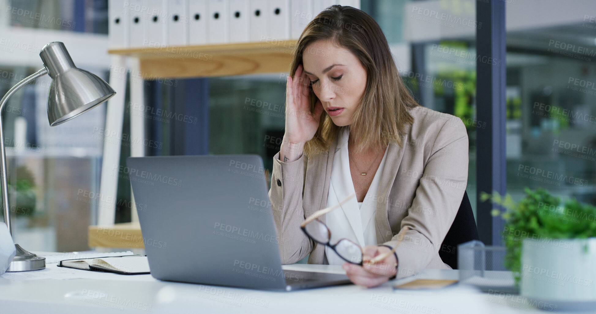 Buy stock photo Burnout, employee and woman with headache, office or accountant with stress, thinking or frustrated. Reflection, bookkeeper or person with laptop for assignment, migraine or overwhelmed with workload