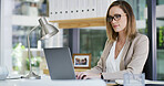 Business, laptop and typing with accountant woman at desk in office for financial audit or review. Computer, budget and finance with employee person in workplace for bookkeeping or revenue analysis