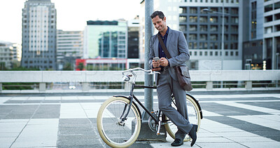 Buy stock photo Bike, phone and text message with businessman in city for eco friendly commute to work location. App, communication and zero emission transport on bicycle with happy employee outdoor in urban town
