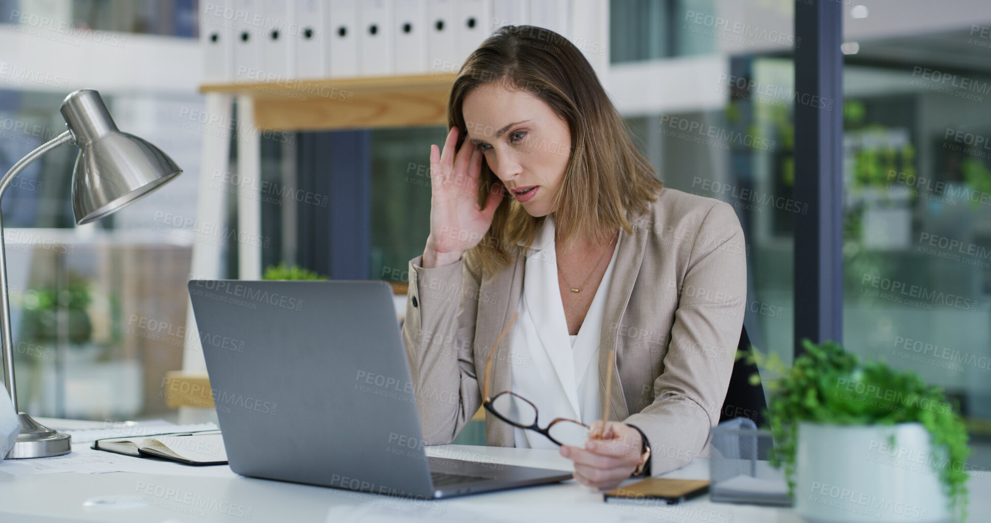 Buy stock photo Stress, employee and woman with laptop, office or accountant with headache, thinking and frustrated. Reflection, bookkeeper and person with tech for assignment, migraine and overwhelmed with workload