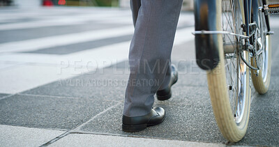 Buy stock photo Bike, shoes and business man in city for carbon footprint, bicycle or eco friendly commute, Sustainability travel, cycling and legs of person walking outdoor for professional CSR transport and career