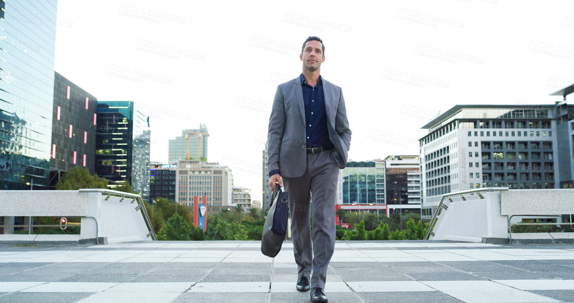 Buy stock photo Thinking, business and man with briefcase in city for travel, planning and vision of urban development. Male realtor, walk and reflection on corporate career, infrastructure and expansion opportunity