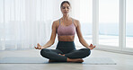 Meditation, lotus pose and zen with woman in  home for calm, spiritual awareness and health. Wellness, mindfulness and inner peace with person in apartment for holistic healing, aura and relax