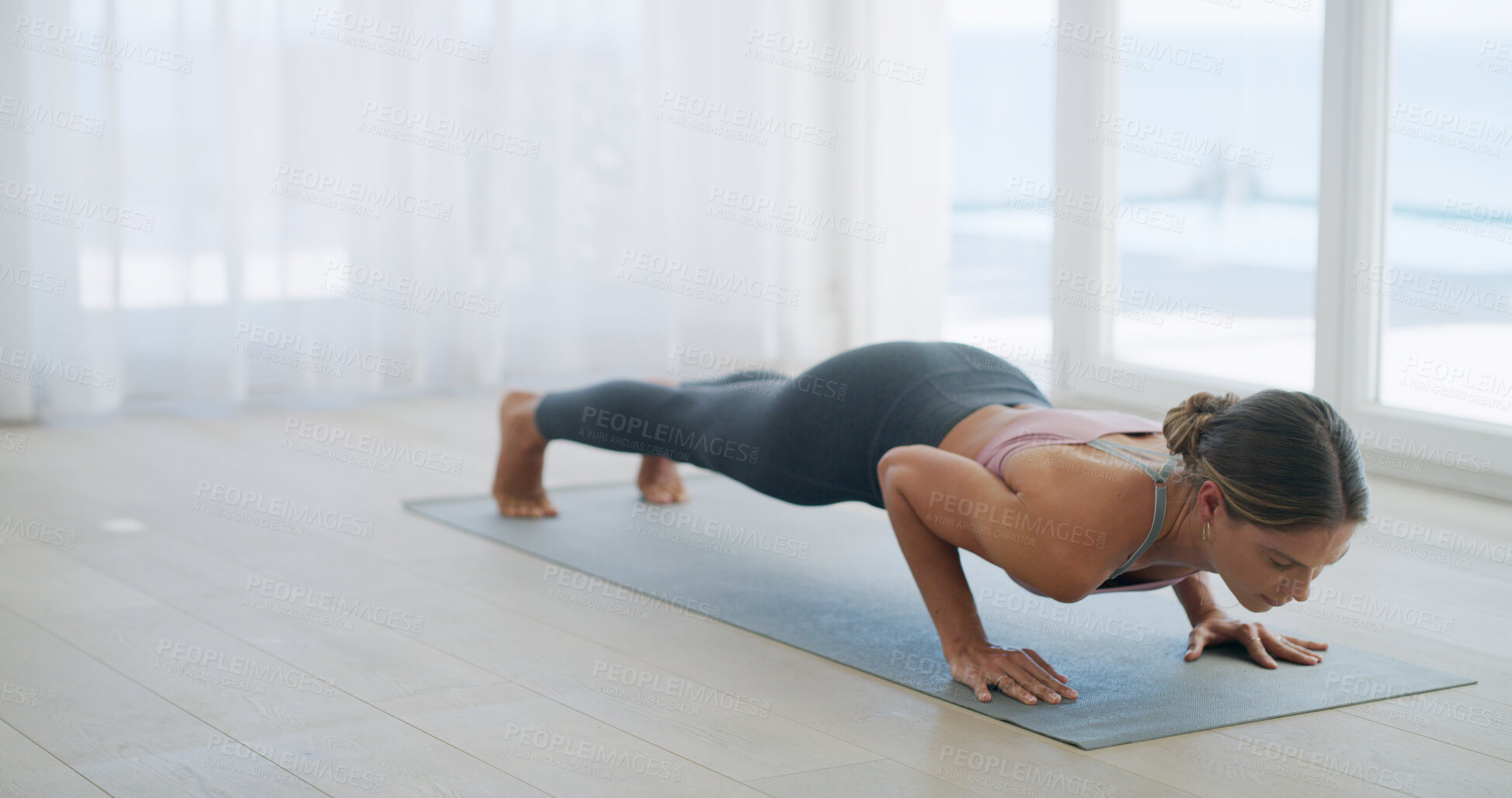 Buy stock photo Push ups, fitness and woman on mat, home or workout routine in living room, balance or core strength. Healthy, person and exercise for muscle, wellness and body stability on floor, space or training