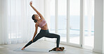 Woman, stretching and yoga for wellness at house with preparation, flexibility and body balance. Female person, warm up and yogi routine with physical fitness, holistic mobility and breathing control